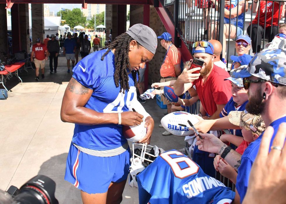 Buffalo Bills linebacker Tremaine Edmunds (49) signs autographs for the fans at St. John Fisher University.