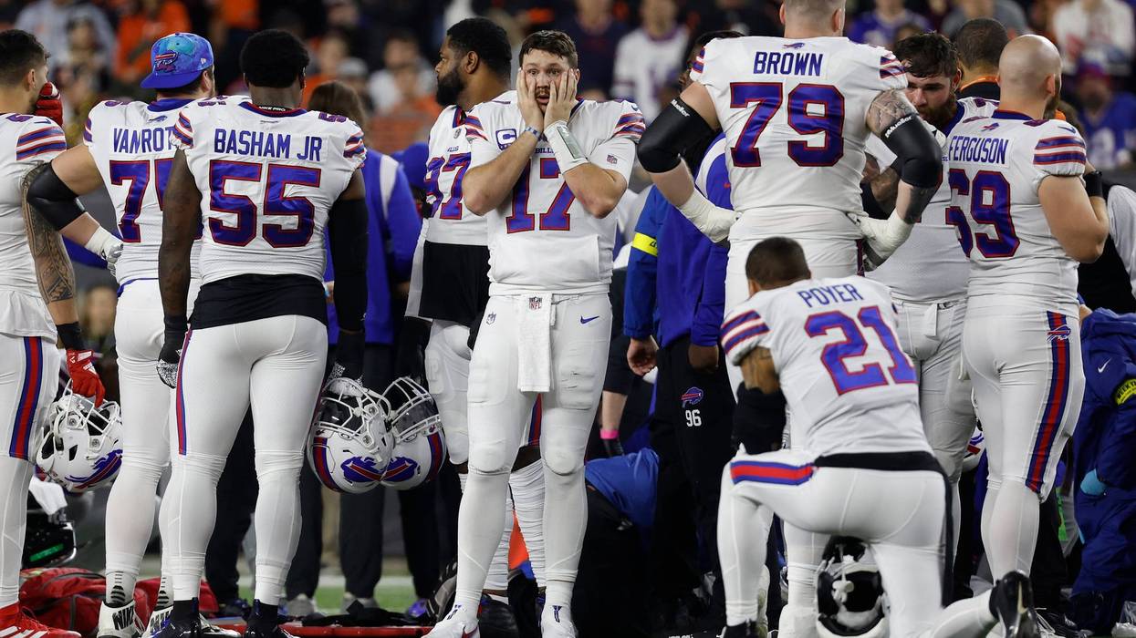 Buffalo Bills players react after teammate Damar Hamlin #3 was injured against the Cincinnati Bengals during the first quarter at Paycor Stadium on January 02, 2023 in Cincinnati, Ohio.