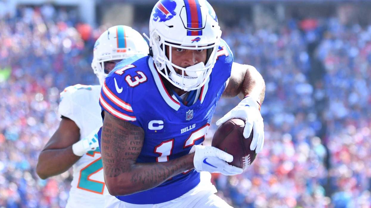 Buffalo Bills wide receiver Gabe Davis (13) scores a touchdown against the Miami Dolphins in the first quarter at Highmark Stadium.