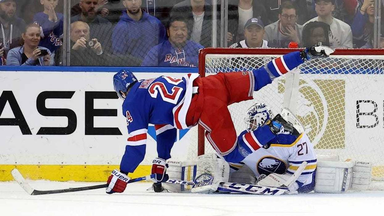 Buffalo Sabres goaltender Devon Levi (27) makes the game winning save against New York Rangers right wing Kaapo Kakko (24) during the shootout at Madison Square Garden.