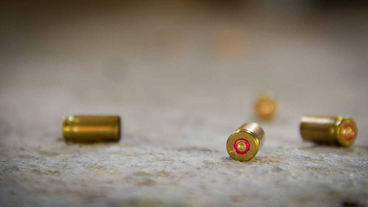 Bullet casings lying on the ground.