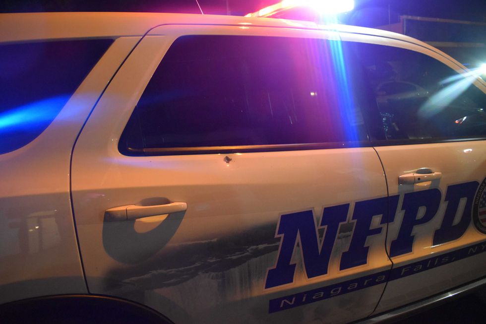 Bullet hole in the Niagara Falls Police vehicle