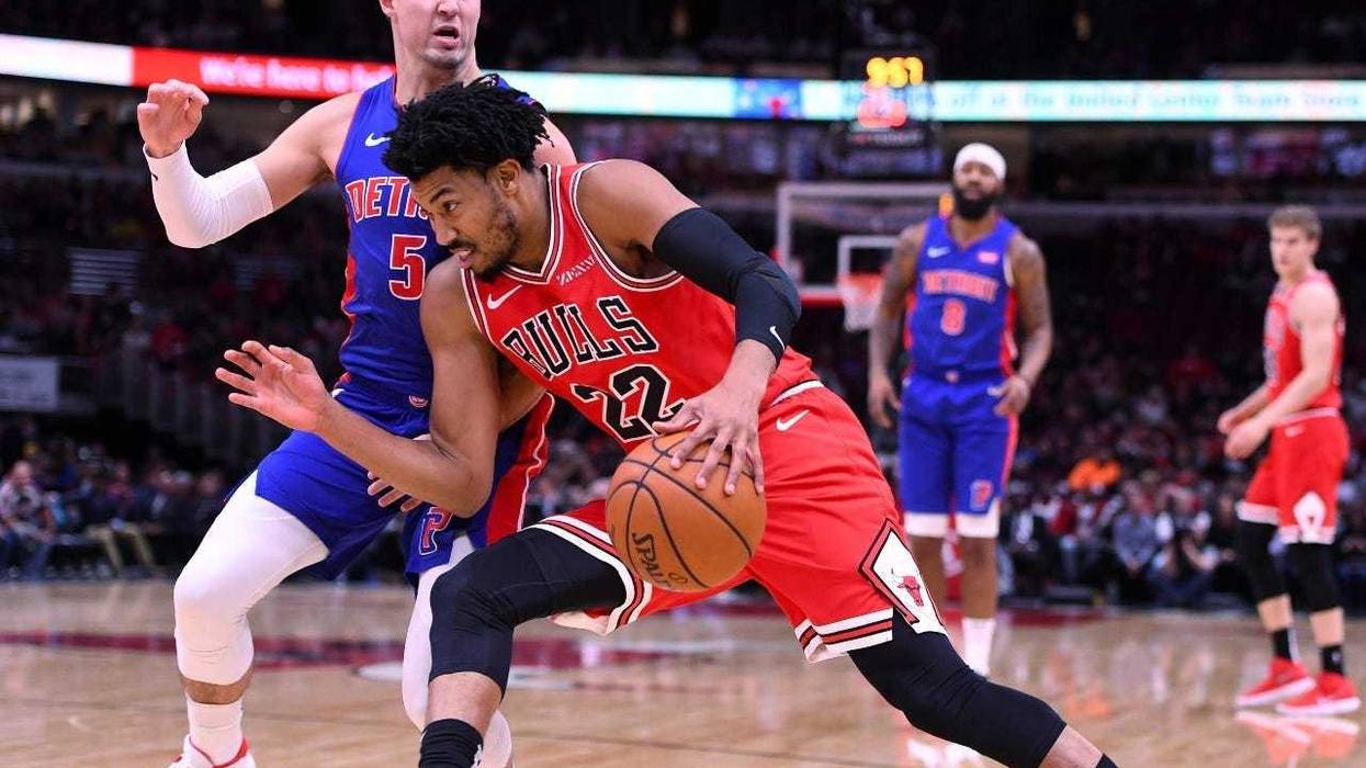 Bulls forward Otto Porter Jr. (22) dribbles the ball against Pistons guard Luke Kennard (5).