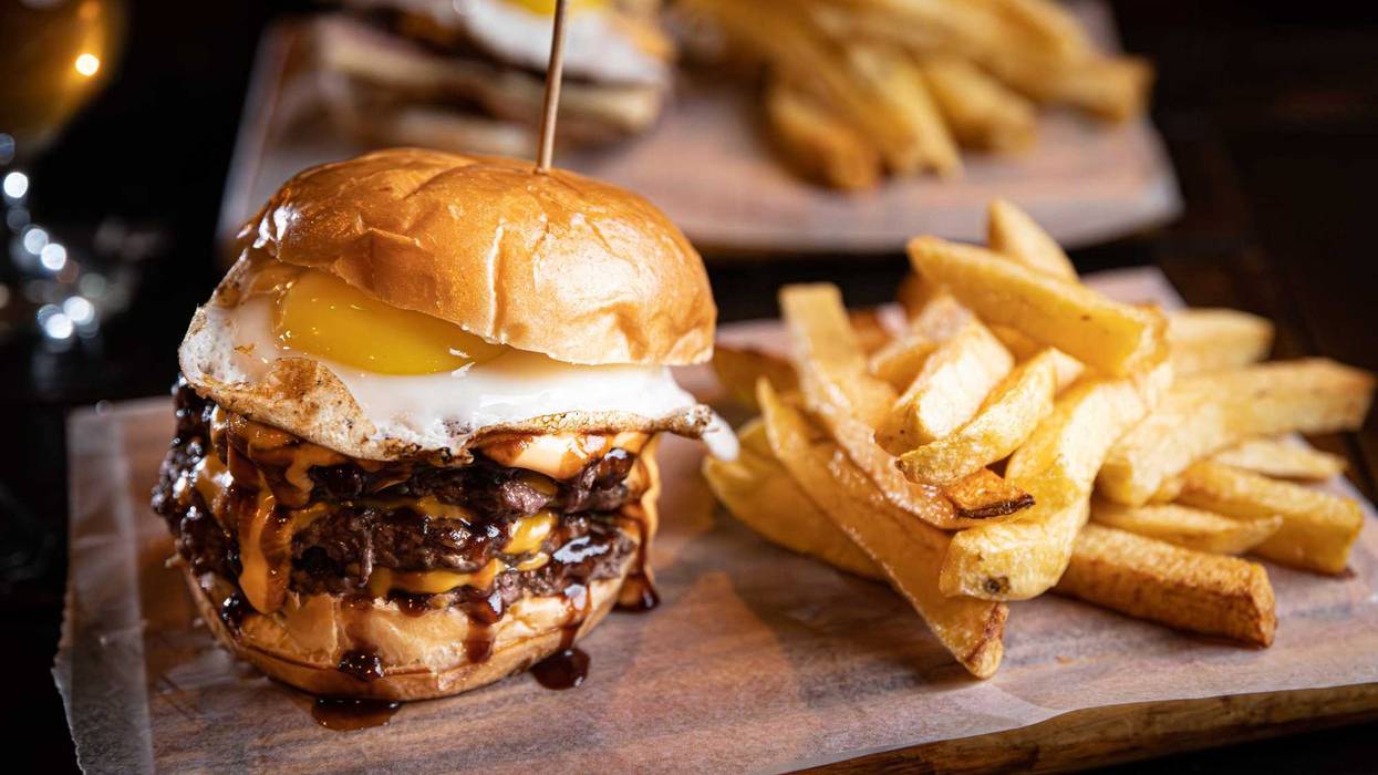 Burger with a fried egg on it.