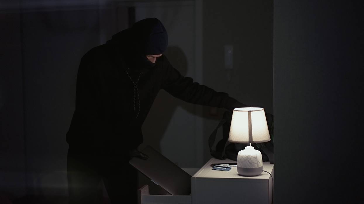 Burglar stealing.