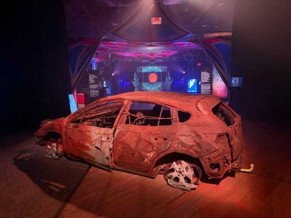 Burned cars from the deadly stretch of road leaving the Nova Music Festival