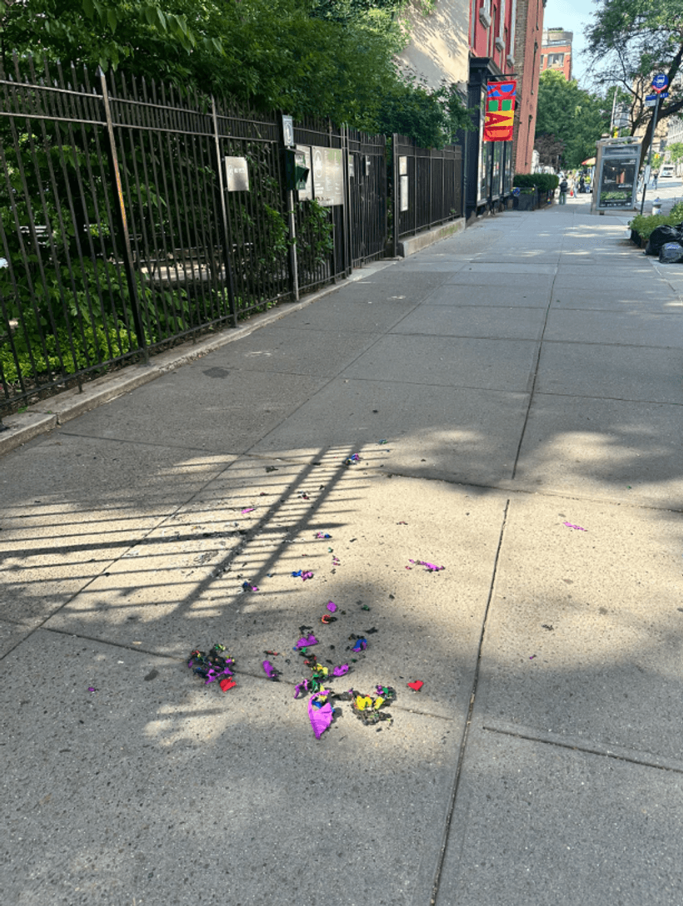 Burned pieces of Pride flags found on 22nd Street in Chelsea, Manhattan on Friday morning.