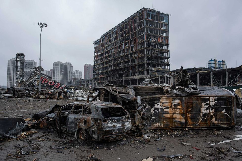 Burnt cars are seen in the parking lot of the Retroville trade center on April 3, 2022 in Kyiv, Ukraine
