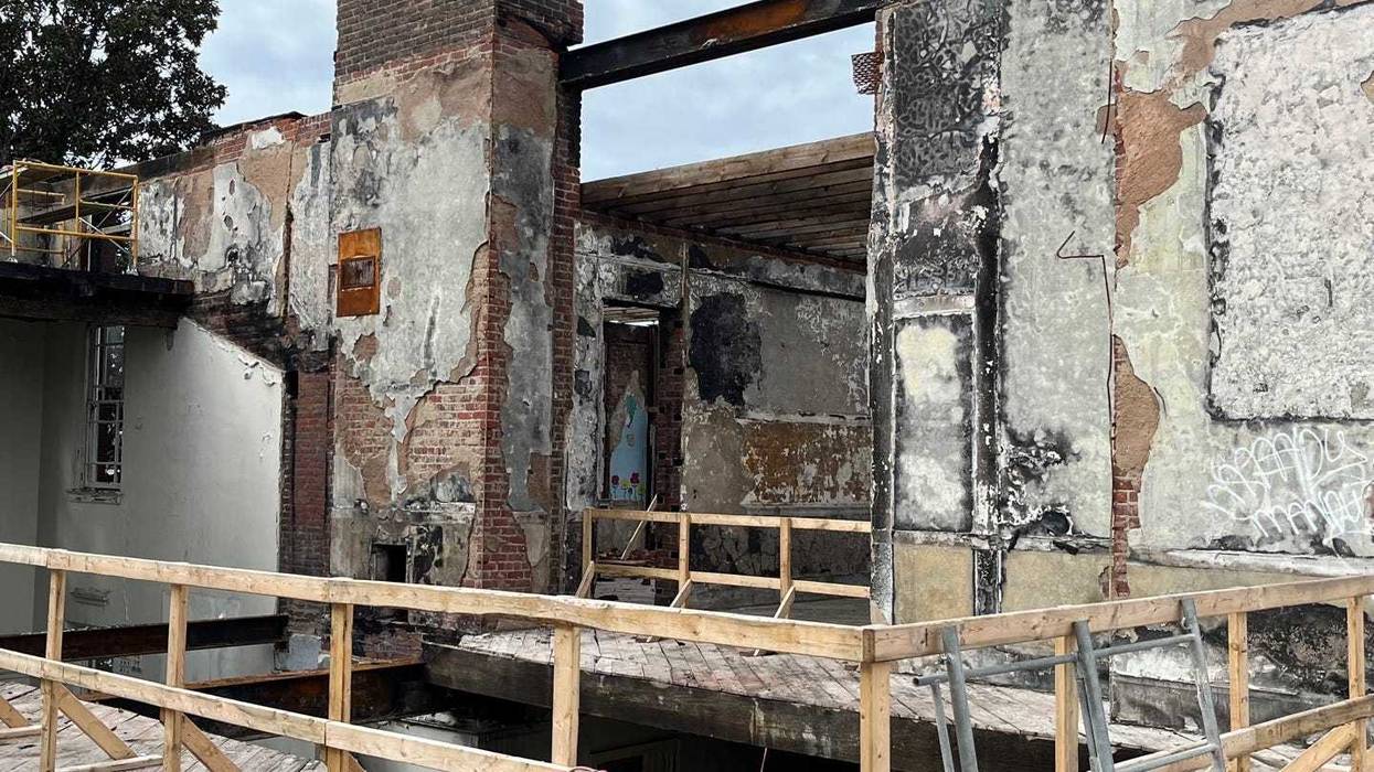 Burnt out bricks and wood plank floors