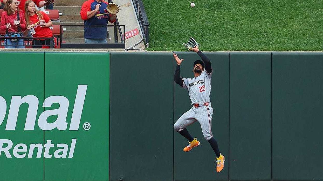 Byron Buxton #25 of the Minnesota Twins catches a fly ball against the St. Louis Cardinals in the fifth inning at Busch Stadium. But too many of the Cardinal fly balls made it over the fence.