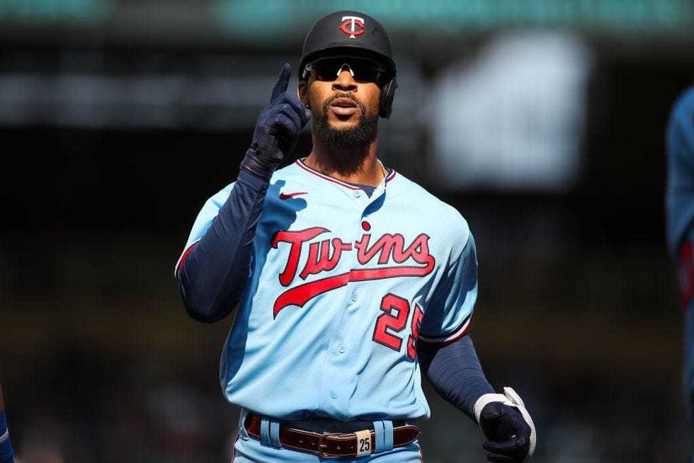 Byron Buxton #25 of the Minnesota Twins celebrates after hitting a single against the Kansas City Royals in the sixth inning of the game at Target Field on September 12, 2021 in Minneapolis, Minnesota. The Royals defeated the Twins 5-3.