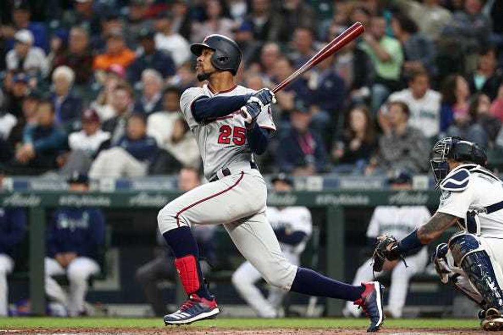 Byron Buxton #25 of the Minnesota Twins hits a three-run home run against the Seattle Mariners in the fourth inning during their game at T-Mobile Park on May 16, 2019 in Seattle, Washington.