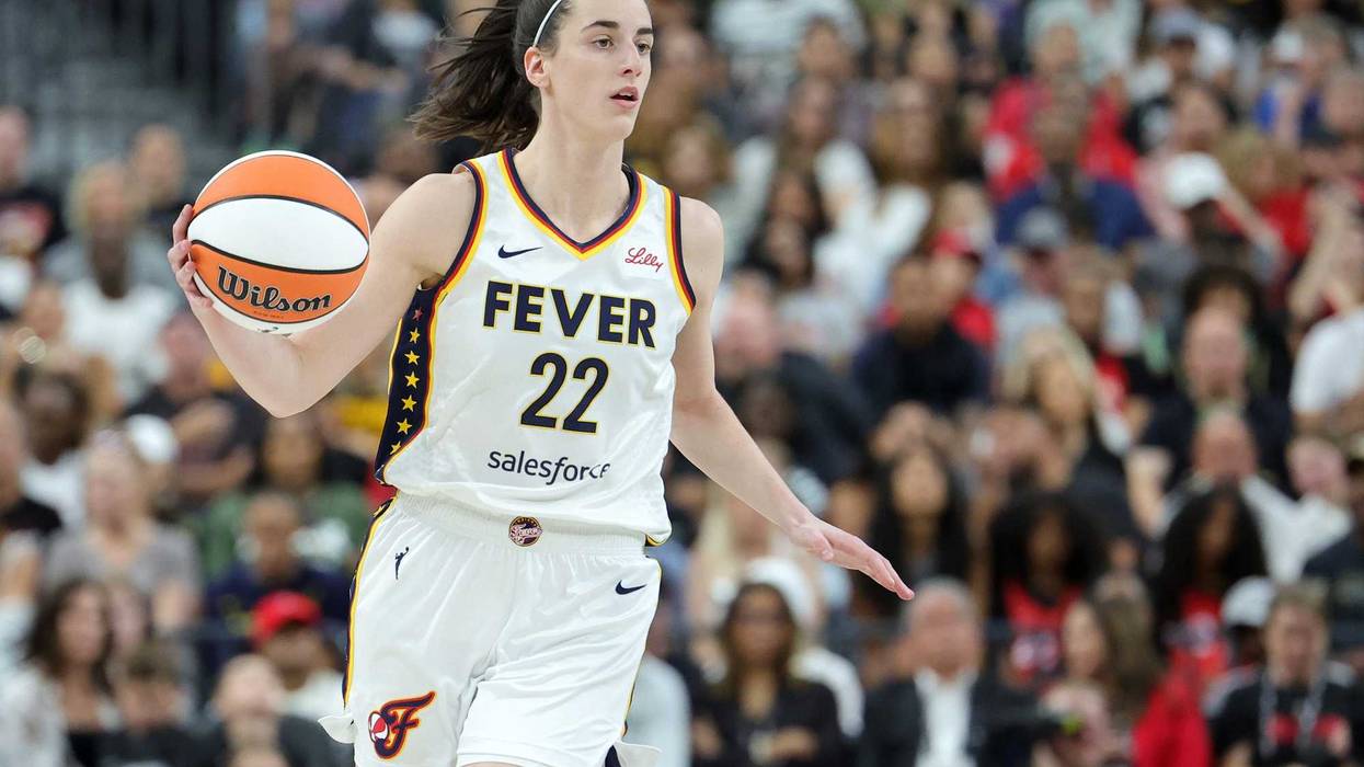Caitlin Clark #22 of the Indiana Fever brings the ball up the court against the Las Vegas Aces in the first quarter of their game at T-Mobile Arena on July 2, 2024, in Las Vegas, Nevada.