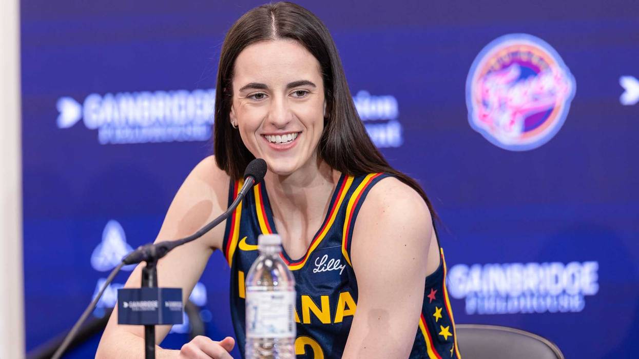 Caitlin Clark #22 of the Indiana Fever talks to reporters during media day activities at Gainbridge Fieldhouse on May 1, 2024 in Indianapolis, Indiana.