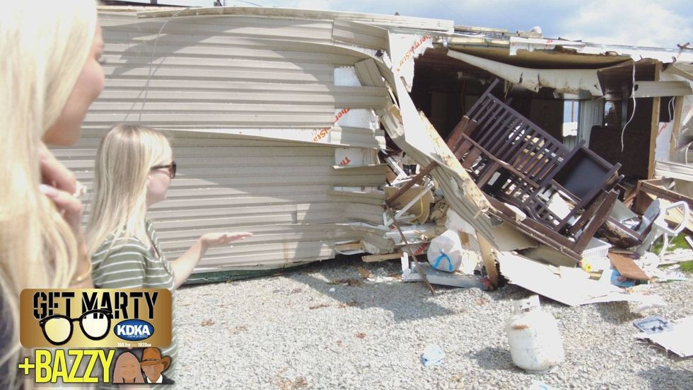 Caitlin shows Arianna destroyed home