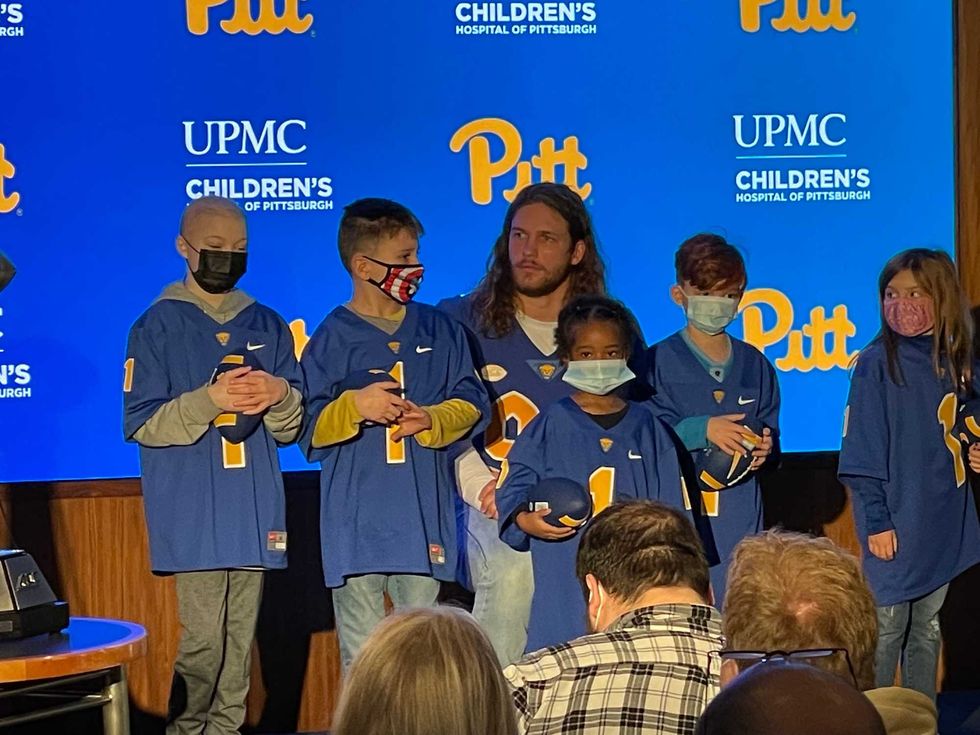 Cal Adomitis with kids from Children