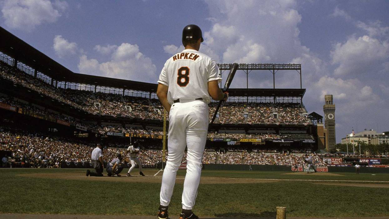 Cal Ripken Jr. of the Baltimore Orioles waits on deck in a game against the California Angels during the 1995 Season at Camden Yards.