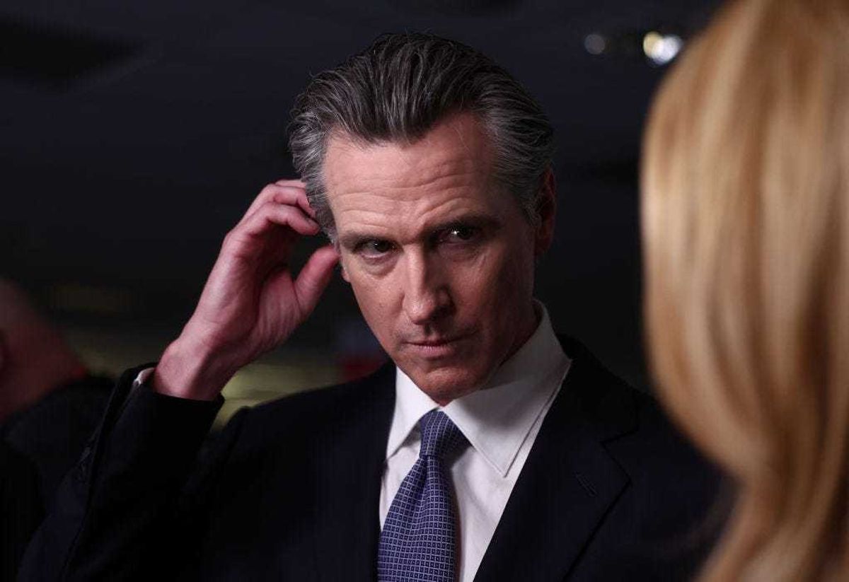 California Gov. Gavin Newsom talks to reporters in the spin room following the FOX Business Republican Primary Debate at the Ronald Reagan Presidential Library on September 27, 2023 in Simi Valley, California.