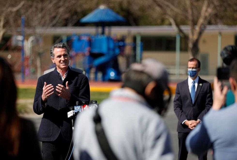California Gov. Gavin Newson speaks during a news conference after touring Barron Park Elementary School on March 02, 2021 in Palo Alto, California.