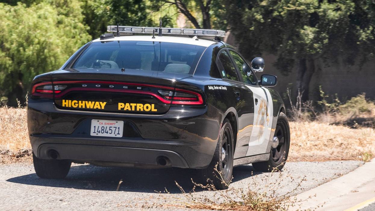 california highway patrol car on shoulder of road
