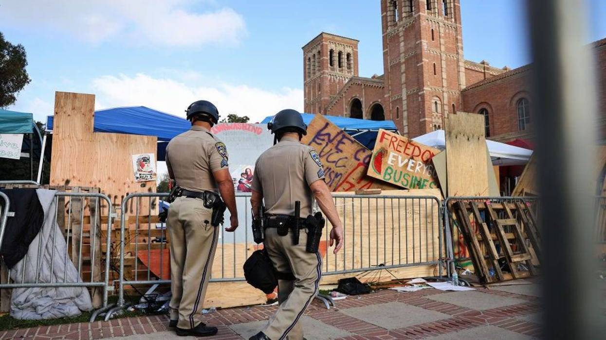 California Highway Patrol (CHP) officers patrol at a pro-Palestinian encampment, the morning after it was attacked by counter-protestors at the University of California, Los Angeles (UCLA) campus, on May 1, 2024 in Los Angeles, California.