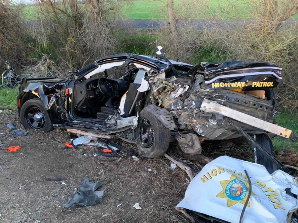 California Highway Patrol said an SUV carrying Frayer and two other unidentified people hit the back of this patrol car, ultimately colliding with a tree before being engulfed in flames.