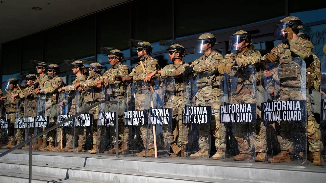 California National Guard stand in formation guarding the federal building in downtown Los Angeles on Tuesday, June 10, 2025.
