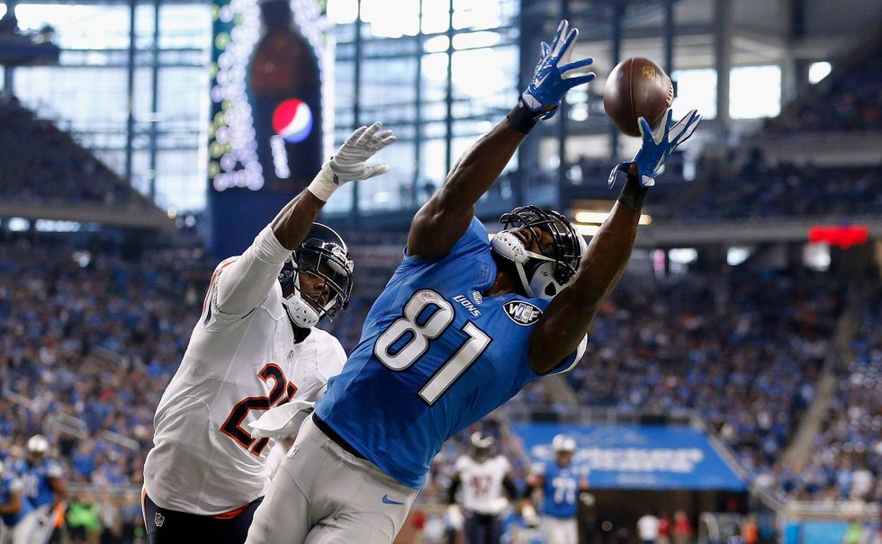 Calvin Johnson extends for a lunging catch against the division-rival Bears