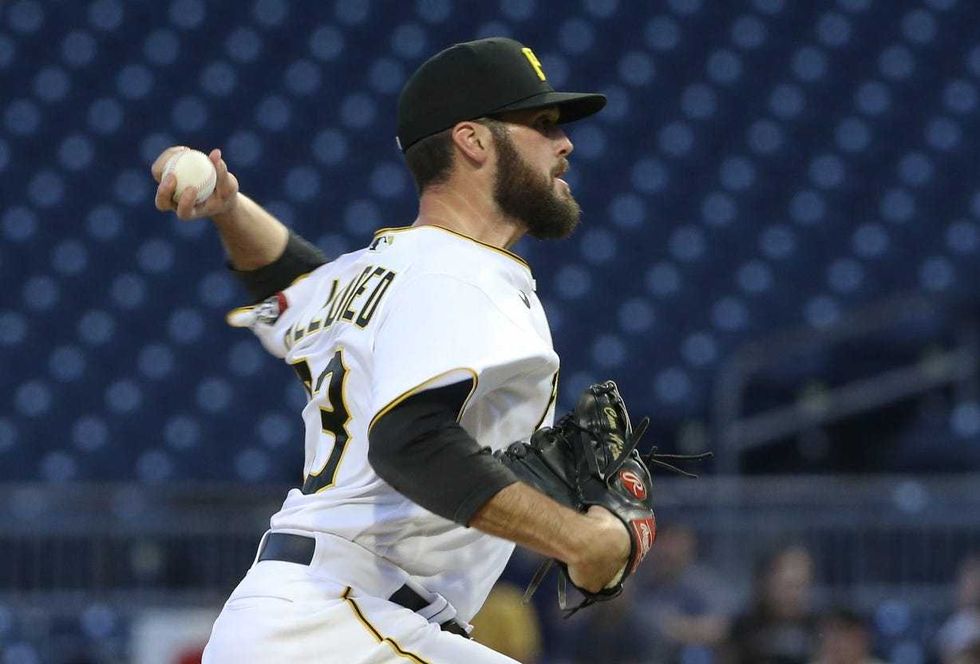 Cam Alldred pitching