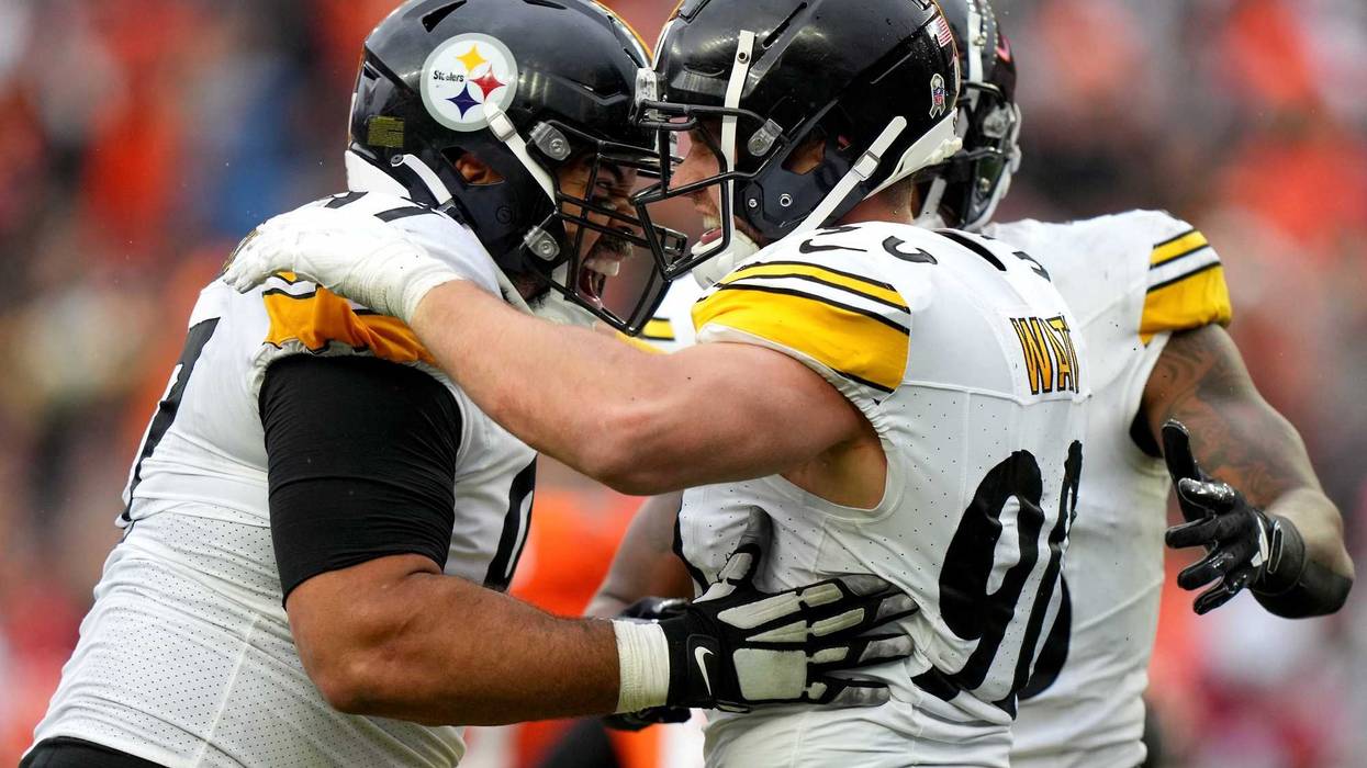Cam Heyward and TJ Watt embracing