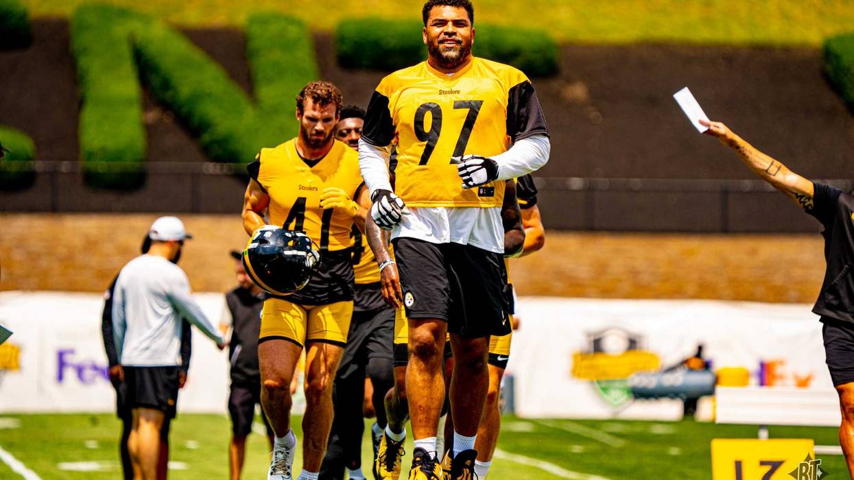Cam Heyward going through stretching
