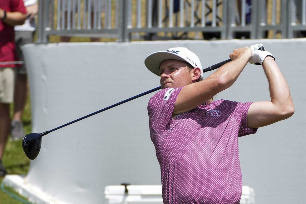 Cam Smith plays from the first tee during the final round of the FedEx St. Jude Championship golf tournament