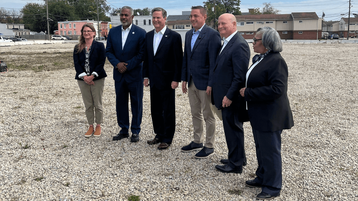 Camden Vic Carstarphen poses for a photo alongside other officials, including U.S. Rep. Donald Norcross, at the former site of a four-story contaminated dirt pile in Camden on Thursday, Oct. 1, 2026.
