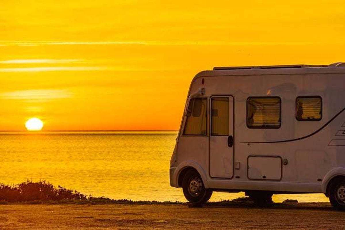 Camper rv at sunrise on mediterranean coast Costa del Sol, Andalucia Spain