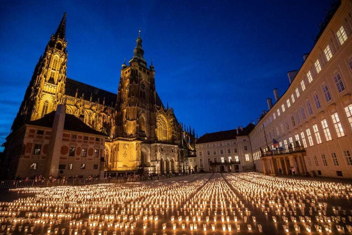 Candles are placed to commemorate victims of the COVD-19 pandemic at the Prague Castle on May 10, 2021 in Prague, Czech Republic. This month, popular Czech folk singer Hanka Horká also perished from the virus.