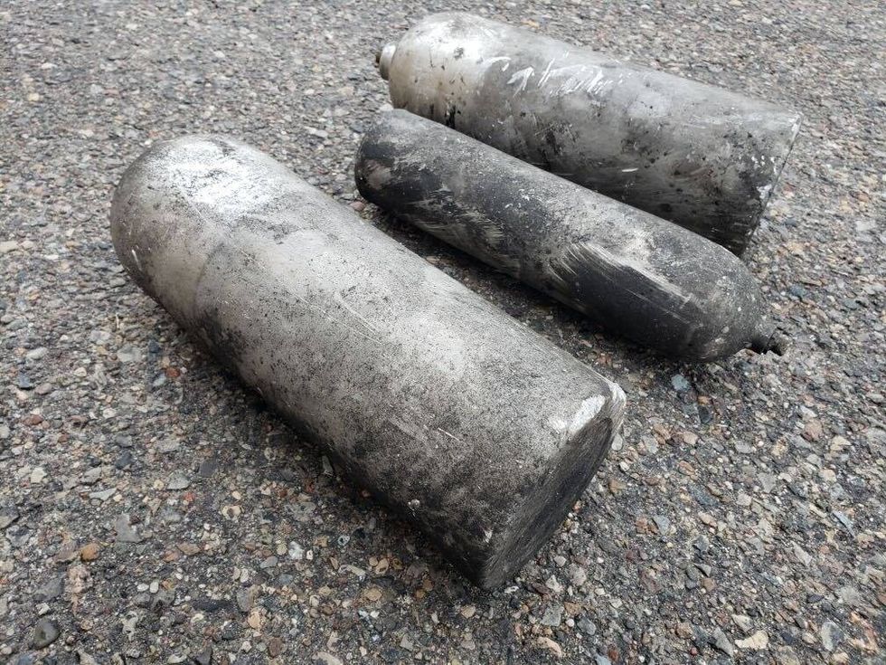 Cannisters sent flying in explosions in Clinton Twp. Monday.