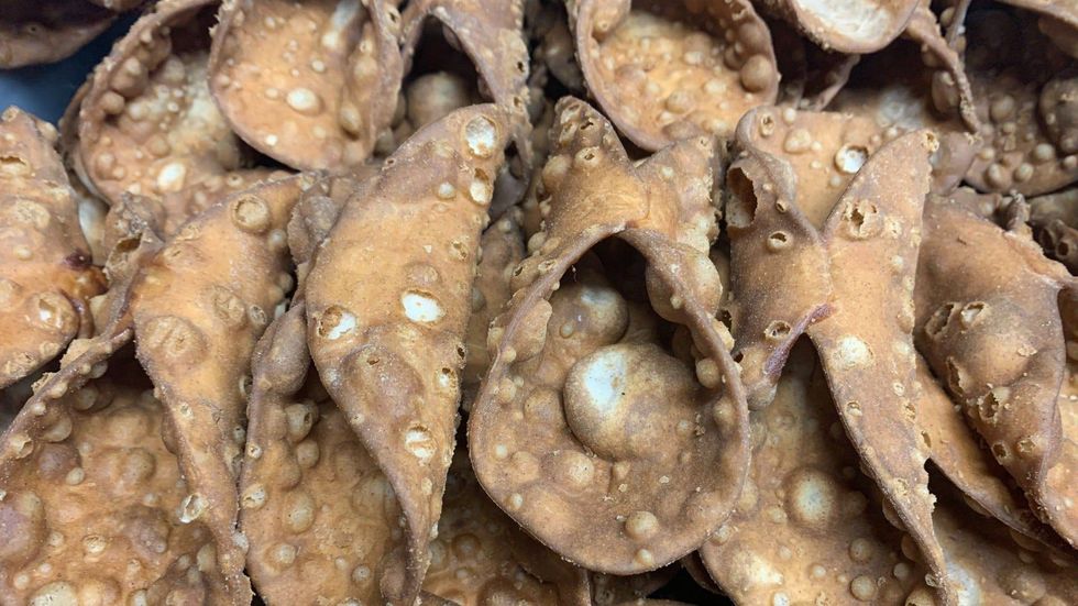 Cannoli shells waiting to be filled.