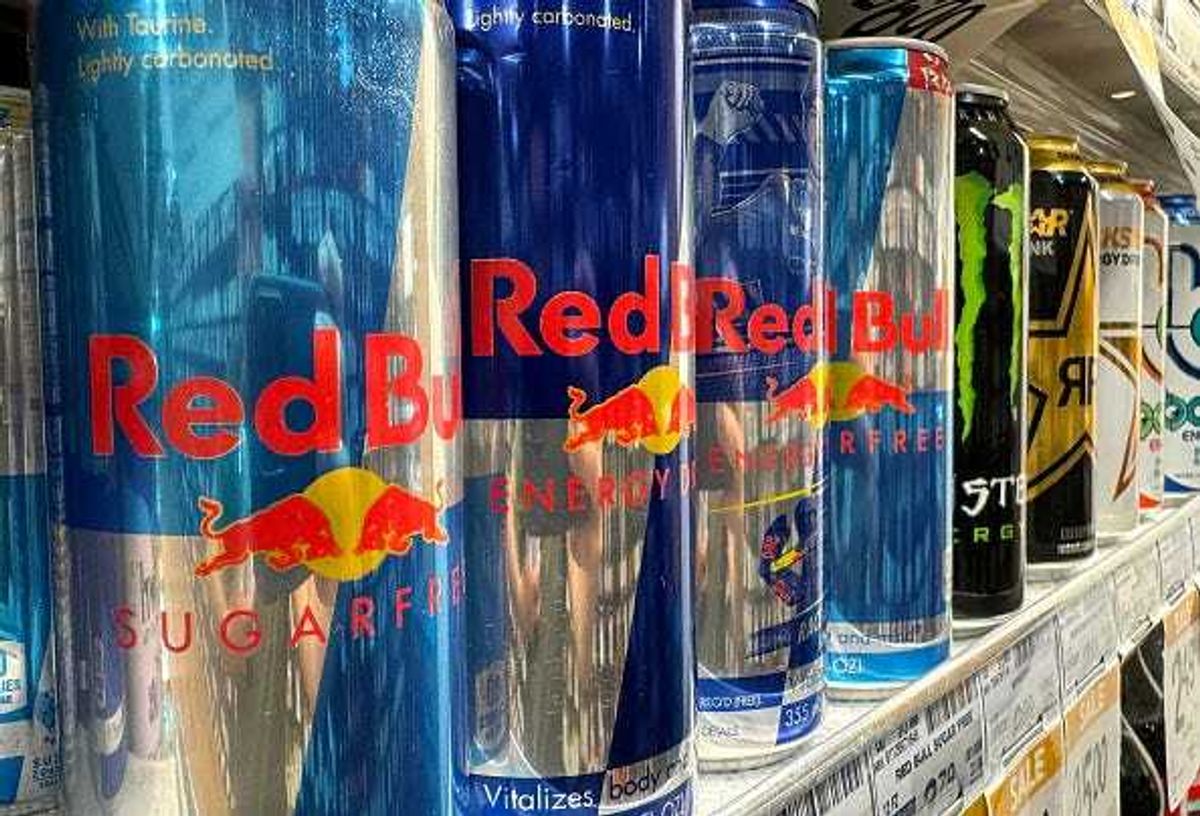 Cans of Red Bull energy drinks are displayed on a store shelf on June 19, 2024 in San Anselmo, California.