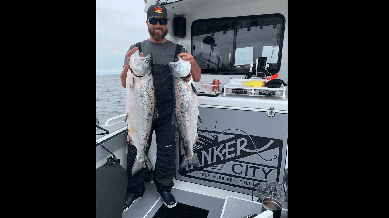 Captain John Marfia with his salmon catch in Half Moon Bay
