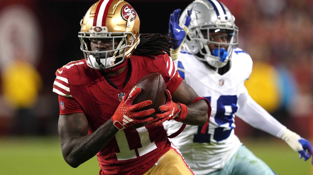 Caption: Oct 8, 2023; Santa Clara, California, USA; San Francisco 49ers wide receiver Brandon Aiyuk (11) runs after a catch against Dallas Cowboys cornerback Noah Igbinoghene (19) during the third quarter at Levi's Stadium