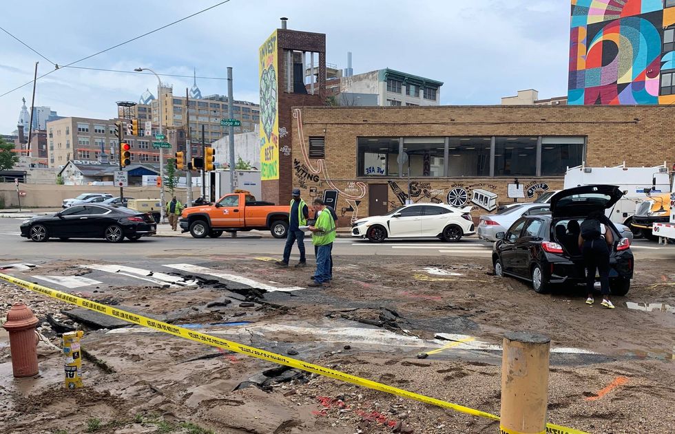 Car gets stuck in Spring Garden sinkhole