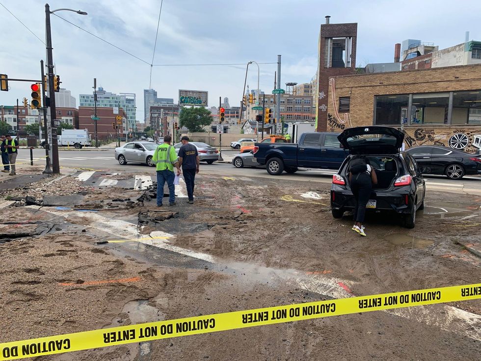 Car gets stuck in Spring Garden sinkhole
