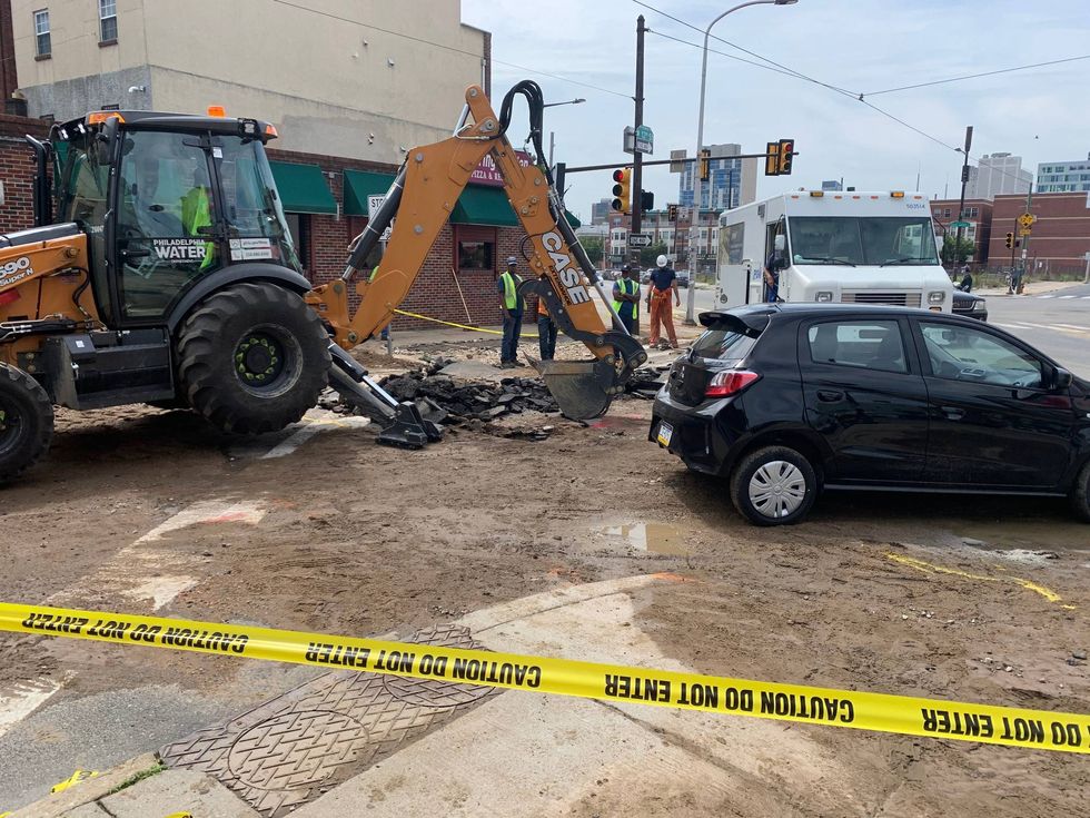 Car gets stuck in Spring Garden sinkhole
