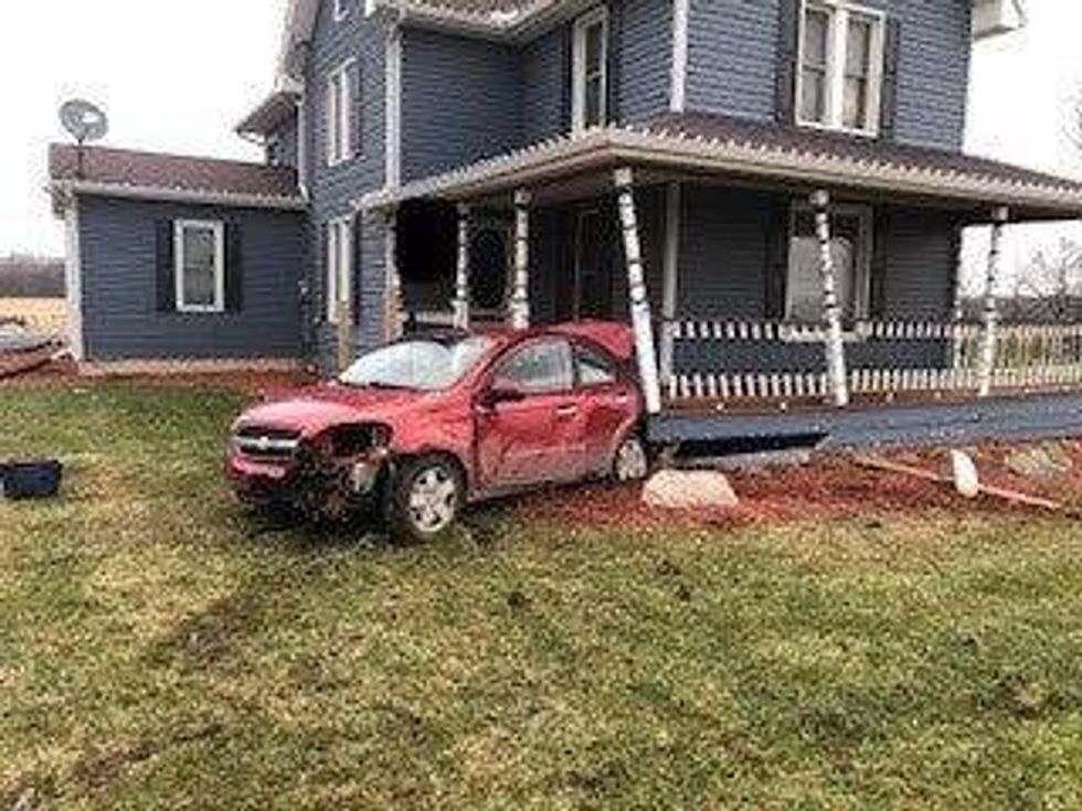 car into house