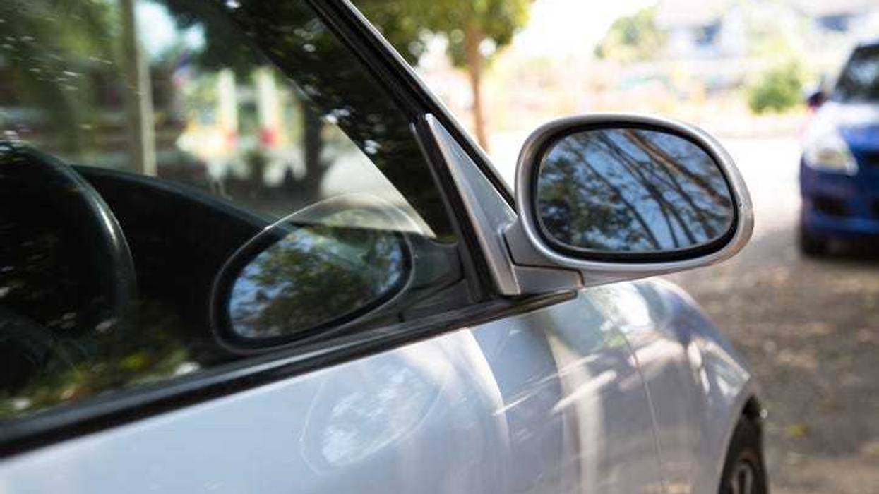 Car parked in the shade on a hot day.