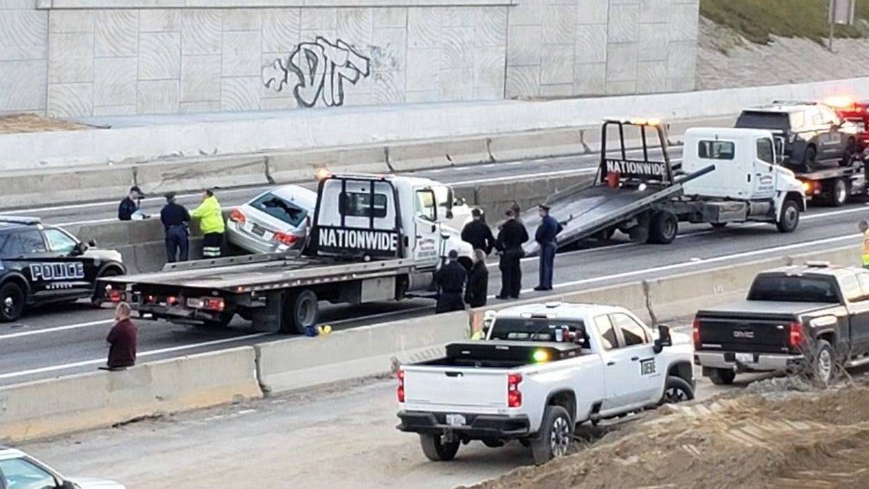Car slams into median wall on I-94 during police chase, leading to officer involved shooting