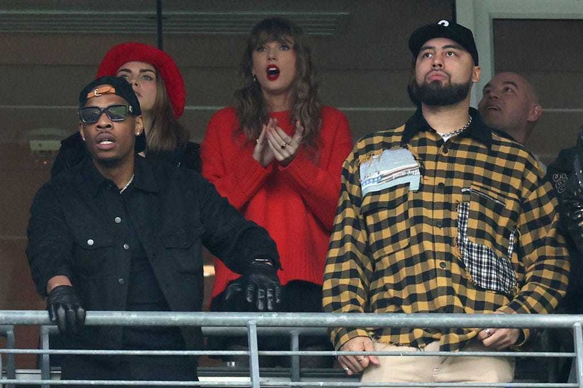 Cara Delevingne, Taylor Swift and Ross Travis look on during the second quarter in the AFC Championship Game between the Baltimore Ravens and the Kansas City Chiefs at M&T Bank Stadium on January 28, 2024 in Baltimore, Maryland. (Photo by Rob Carr/Getty Images)