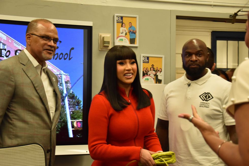 Cardi B with NYC Schools Chancellor David Banks and founder and executive director of Community Capacity Development K. Bain