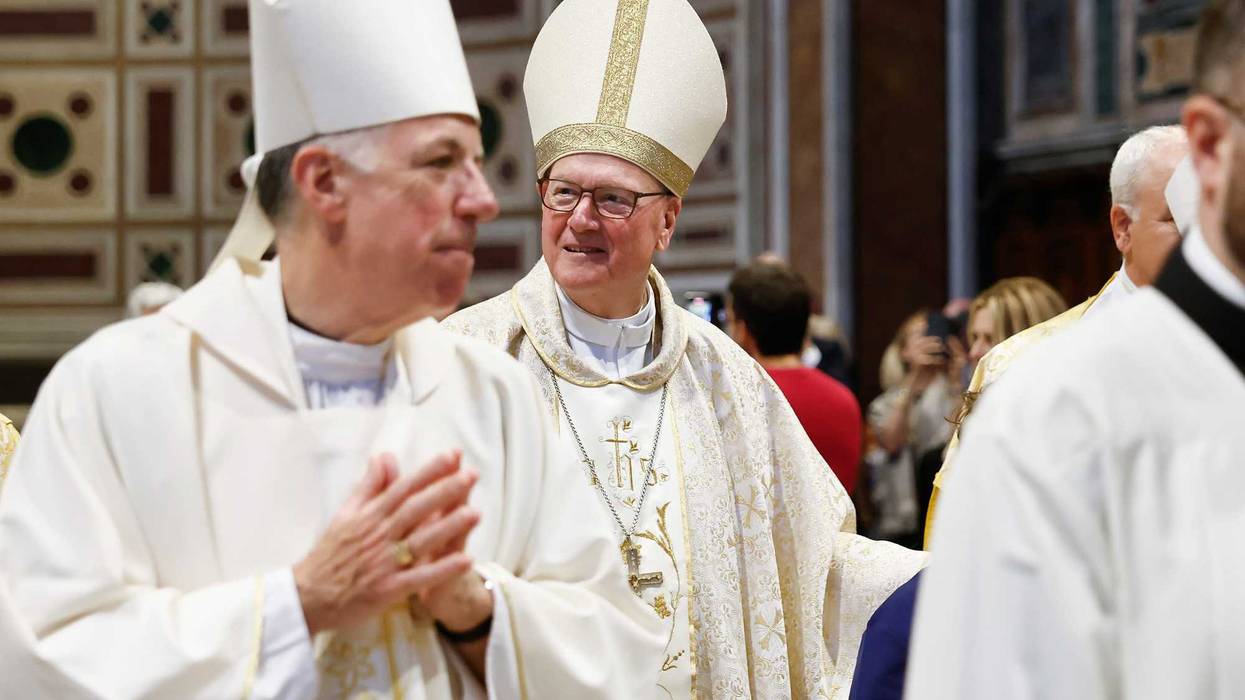 Cardinal Timothy Dolan (C) departs after leading a Mass in Basilica of Saint John Lateran on May 2, 2025 in Rome, Italy