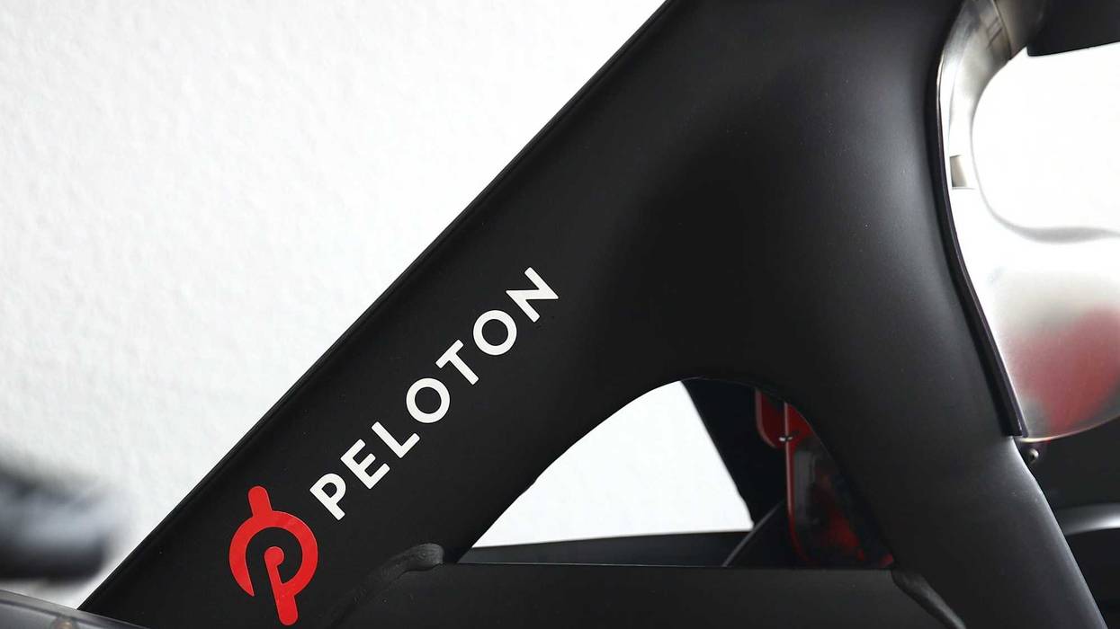 Cari Gundee rides her Peloton exercise bike at her home on April 06, 2020 in San Anselmo, California.